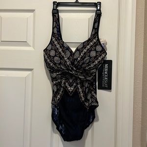 Miraclesuit.  Criss scross escape